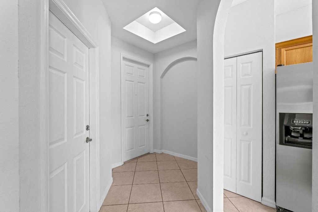 Photo of 1002 Pipers Cay Drive, West Palm Beach, FL 33415 (MLS # R11158425)