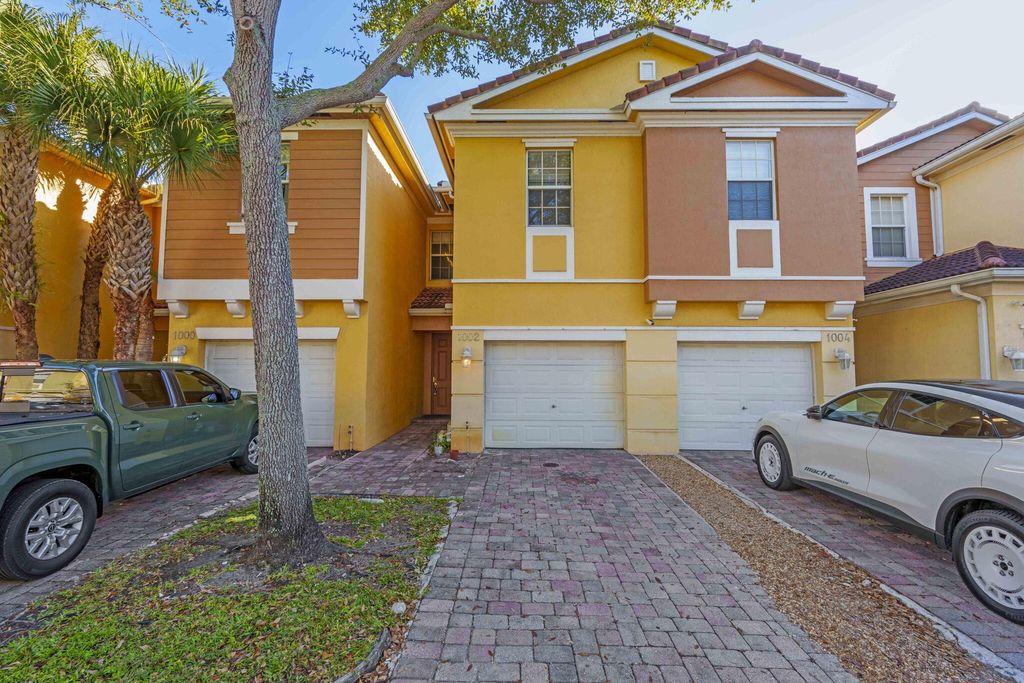 Photo of 1002 Pipers Cay Drive, West Palm Beach, FL 33415 (MLS # R11158425)