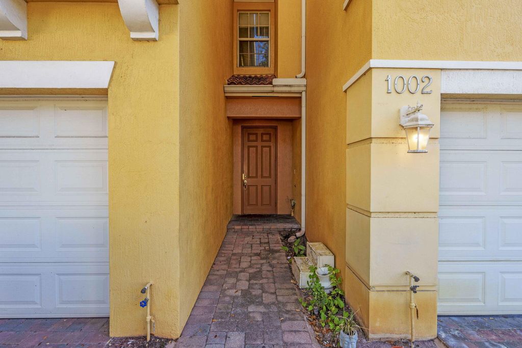 Photo of 1002 Pipers Cay Drive, West Palm Beach, FL 33415 (MLS # R11158425)