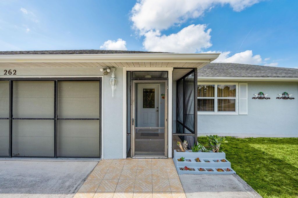 Photo of 262 SW Bedford Road, Port Saint Lucie, FL 34953 (MLS # R11092891)