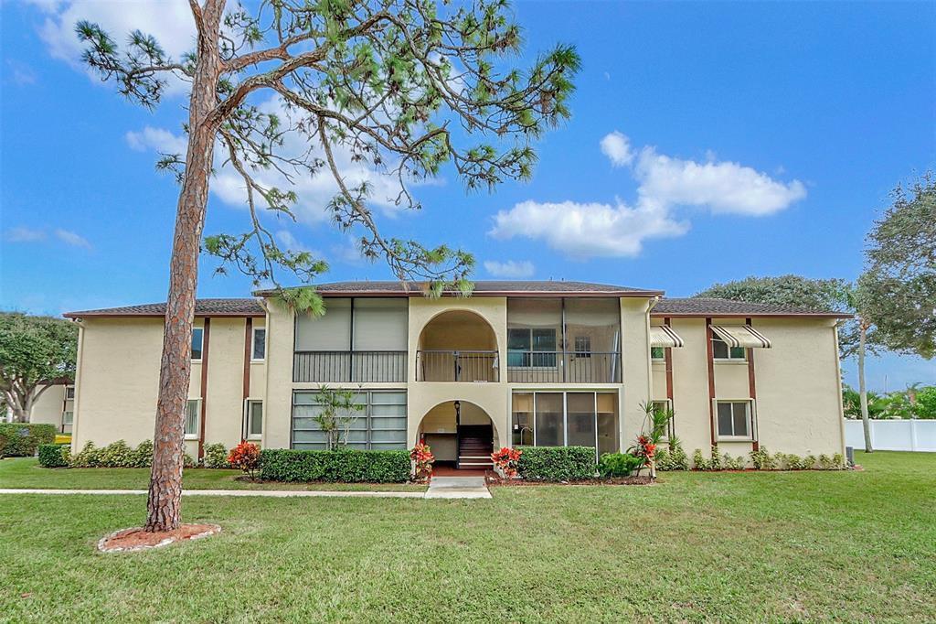 Welcome to La Pinata, a beautifully maintained HOPA community in the charming city of Greenacres. The association does not require a minimum income for approval. This first-floor unit offers easy access and features in-unit laundry with washer and dryer hookups. The enclosed porch creates a cozy Florida room ambiance, and recently installed hurricane shutters offer added peace of mind. A convenient storage unit is also located within the porch area.