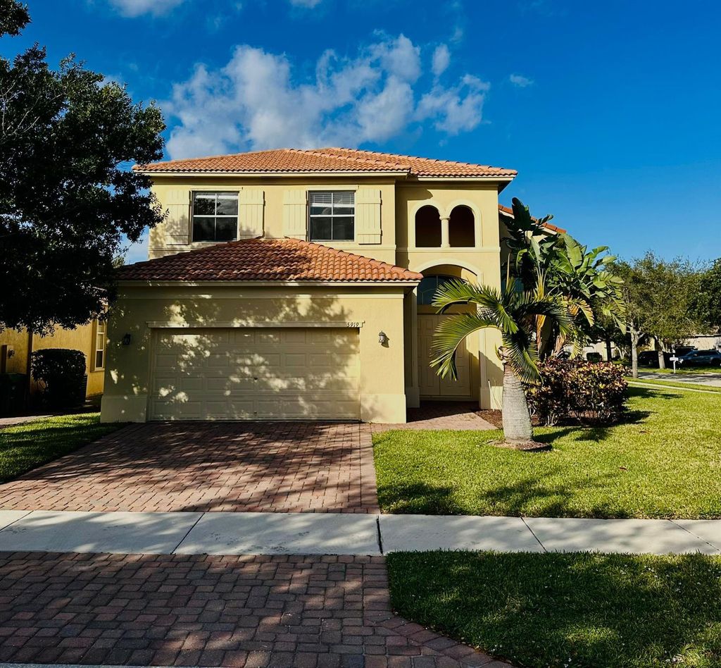 Photo of 5919 Walnut Park Lane, Fort Pierce, FL 34951 (MLS # F10407852)