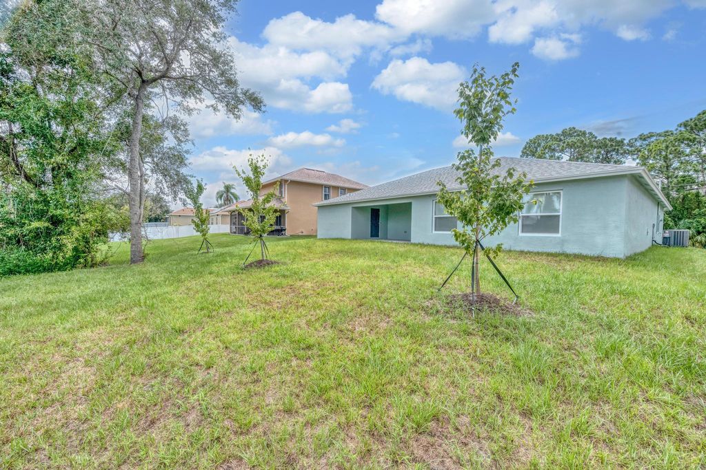 Photo of 1879 SW Lennox Street, Port Saint Lucie, FL 34953 (MLS # R11113496)
