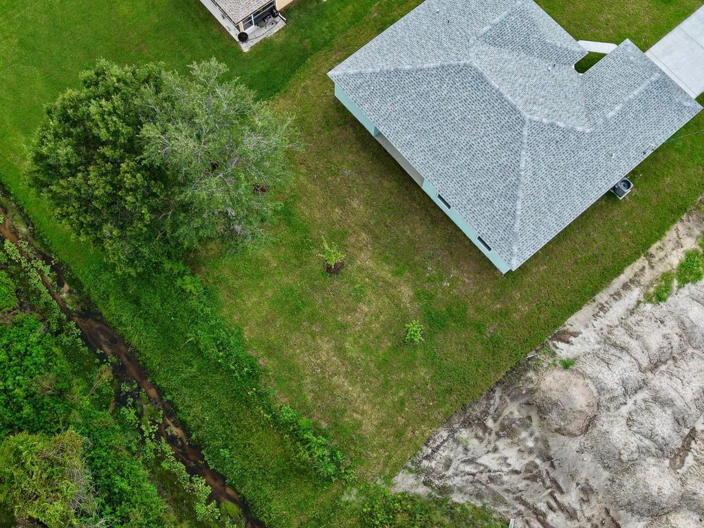 Photo of 1879 SW Lennox Street, Port Saint Lucie, FL 34953 (MLS # R11113496)