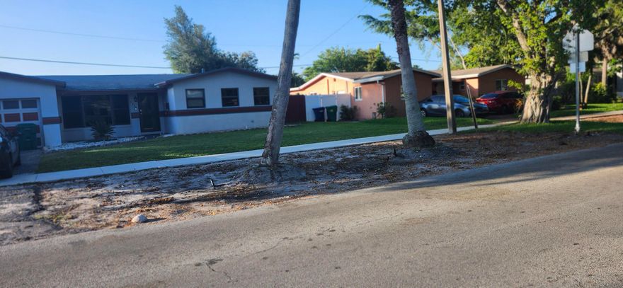 Beautiful single-family home located in the heart of Lauderhill near the Florida's Turnpike. This charming home features 2 bedrooms and 2 updated bathrooms with modern finishes throughout. The updated kitchen boasts elegant waterfall countertops, stainless steel appliances, and beautiful tile flooring that flows throughout the home. Additional upgrades include impact windows, a stunning impact front door, a tankless water heater, and a shingle roof that is approximately 13 years old. The property also offers a one-car garage and a spacious backyard featuring a swimming pool, wooden deck, and dog kennels, making it ideal for a dog breeder or pet lover. This home also includes living room, dining room, and master bedroom furniture that will convey with the sale.