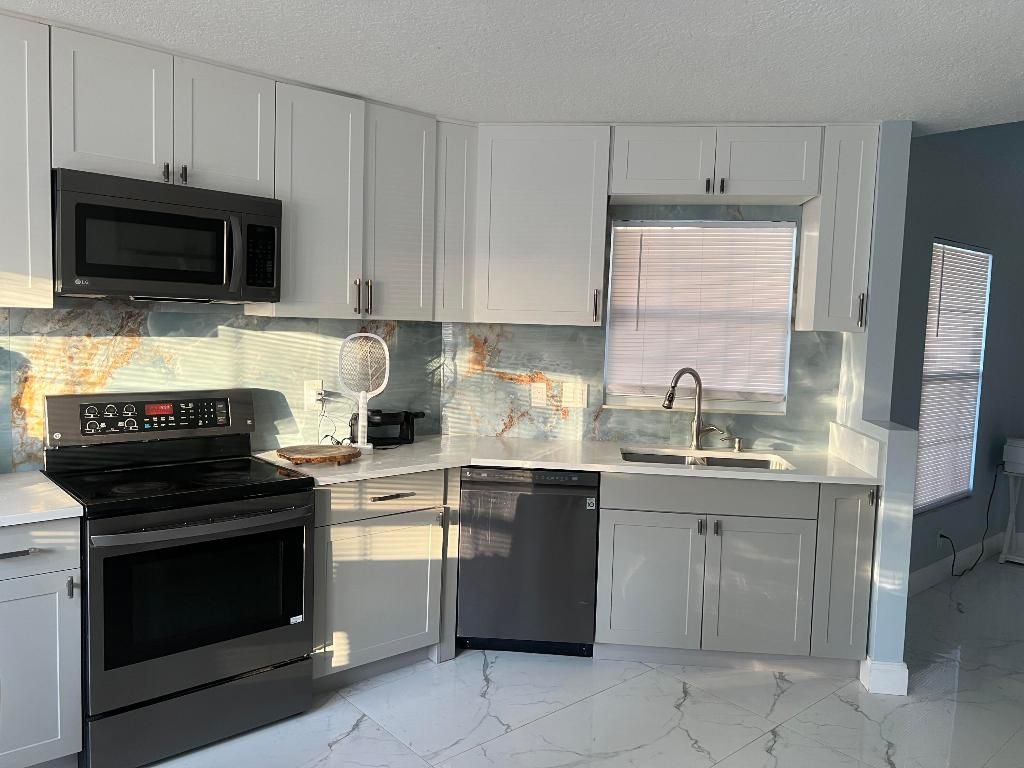 Photo of 12 Misty Meadow Drive, Boynton Beach, FL 33436 (MLS # R11135327)