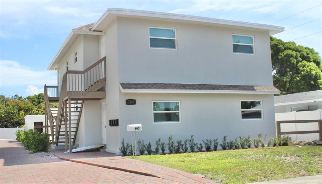 Photo of 305 Cypress Drive Dr #3, Lake Park, FL 33403 (MLS # R10810763)