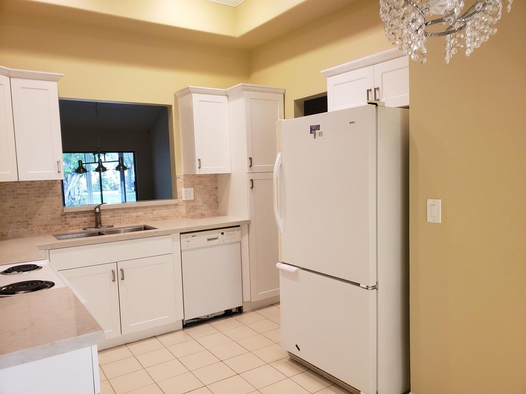 Photo of 10875 Lake Front Place, Boca Raton, FL 33498 (MLS # B26018241)