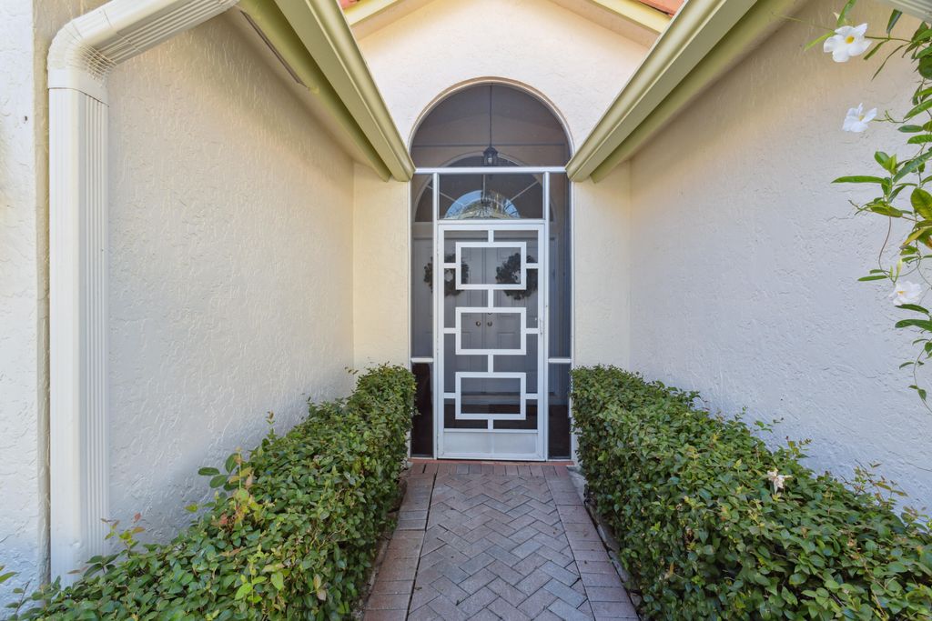 Photo of 2760 Pointe Circle, Greenacres, FL 33413 (MLS # R10938373)