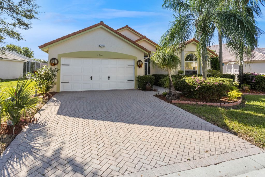 Photo of 2760 Pointe Circle, Greenacres, FL 33413 (MLS # R10938373)