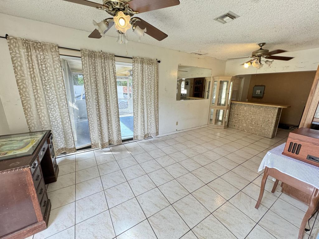 Photo of 4059 Luzon Avenue, Lake Worth, FL 33461 (MLS # R10958616)