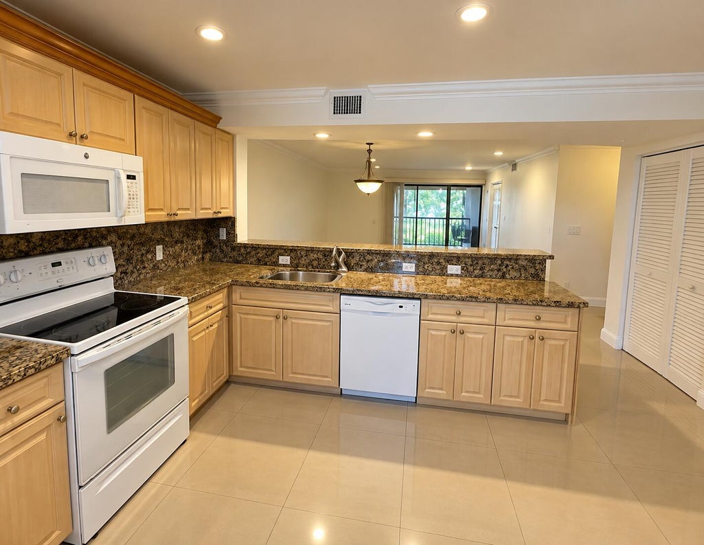 Photo of 1400 NW 45TH Street #B7, Deerfield Beach, FL 33064 (MLS # B26076916)