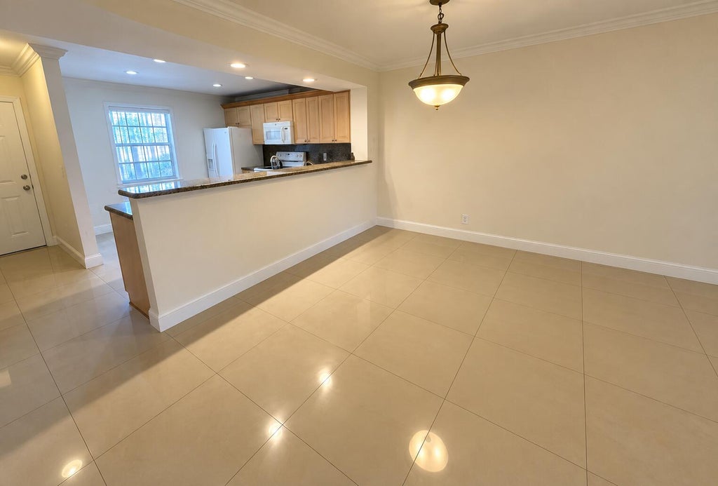 Photo of 1400 NW 45TH Street #B7, Deerfield Beach, FL 33064 (MLS # B26076916)