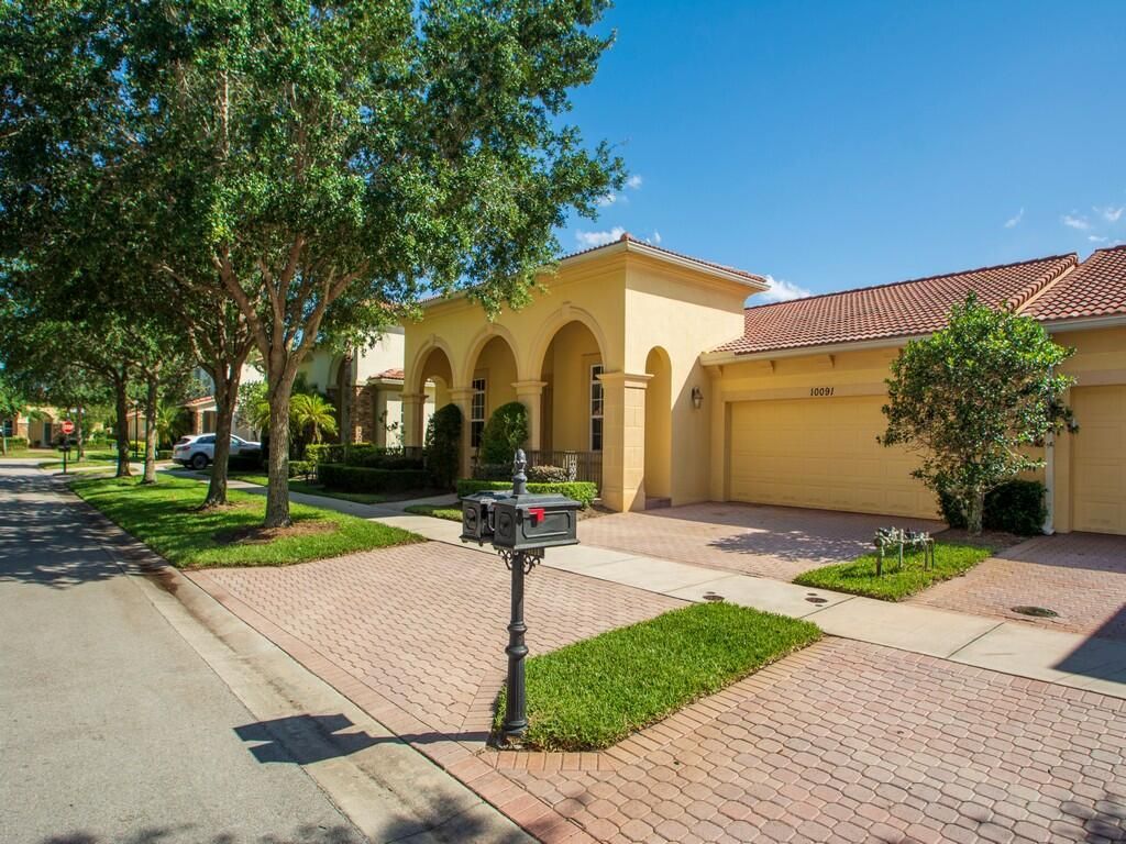 Photo of 10091 SW Dolce Road, Port Saint Lucie, FL 34986 (MLS # B26028997)