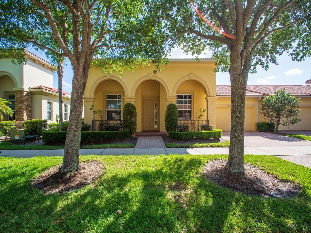 Photo of 10091 SW Dolce Road, Port Saint Lucie, FL 34986 (MLS # B26028997)