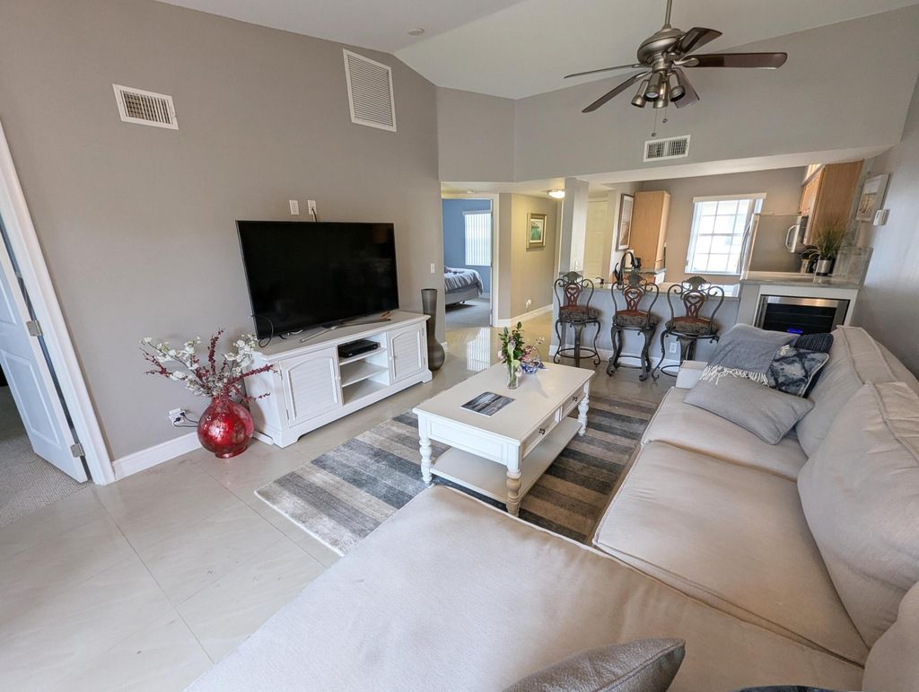 Photo of 1045 Lake Shore Drive #202, Lake Park, FL 33403 (MLS # B26024791)