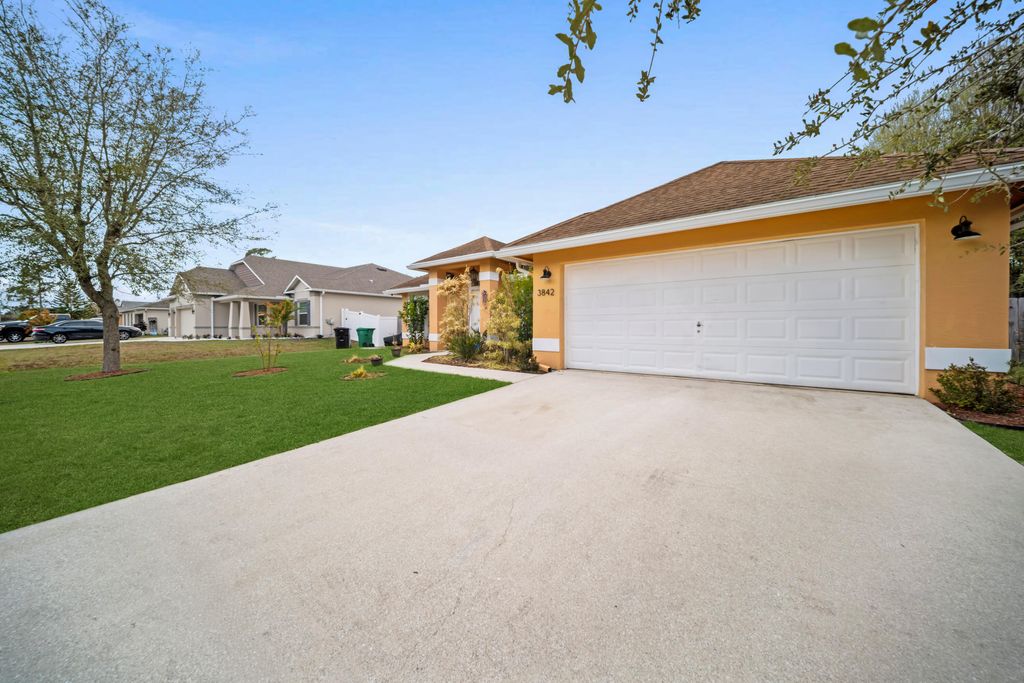 Photo of 3842 SW Ruark Street, Port Saint Lucie, FL 34953 (MLS # R11164652)