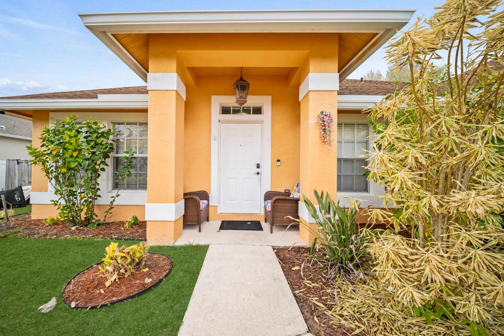 Photo of 3842 SW Ruark Street, Port Saint Lucie, FL 34953 (MLS # R11164652)