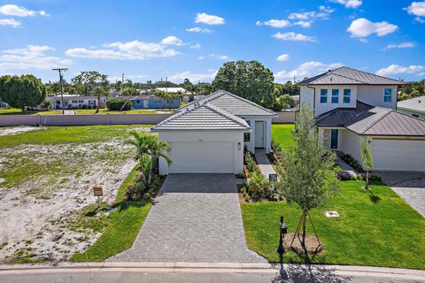 Photo of 308 SE Via Sangro, Port Saint Lucie, FL 34952 (MLS # F10538888)