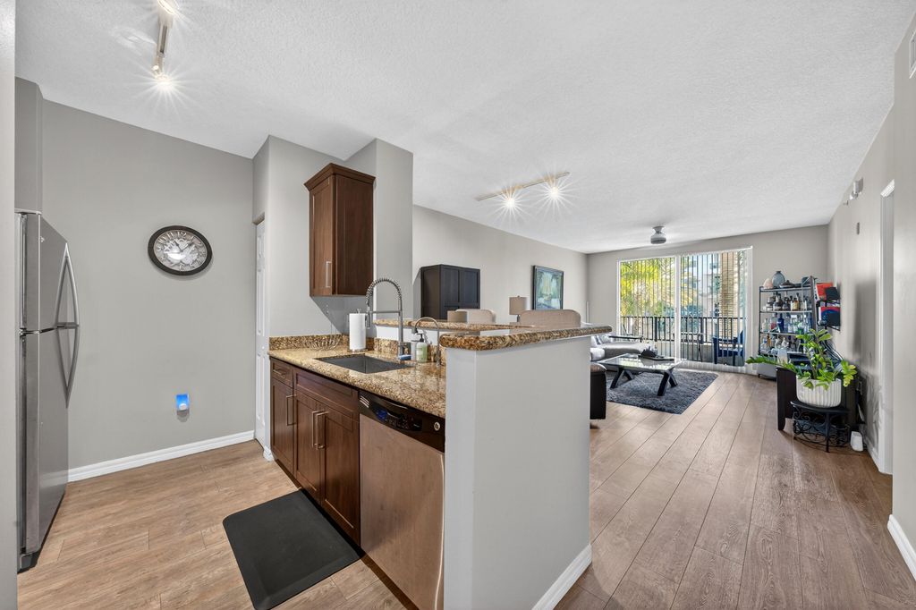 Photo of 2401 NE 65th Street #310, Fort Lauderdale, FL 33308 (MLS # B26007159)