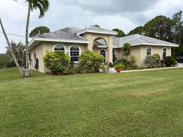 Photo of 16304 Orange Boulevard, The Acreage, FL 33470 (MLS # B26043401)