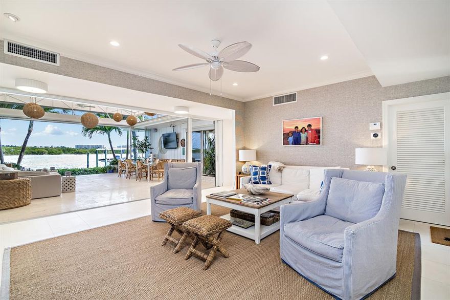 165 feet of direct waterfront point lot, huge covered loggia overlooking the sanctuary.  Water views galore, renovations include new decking, shutters, endless pool upgrades, outdoor lighting, upgraded systems and much more. House has a generator, being offered designer furnished. Brand new 2018 21ft Yamaha jet boat included!!!! Move in ready for the most discriminating buyer.