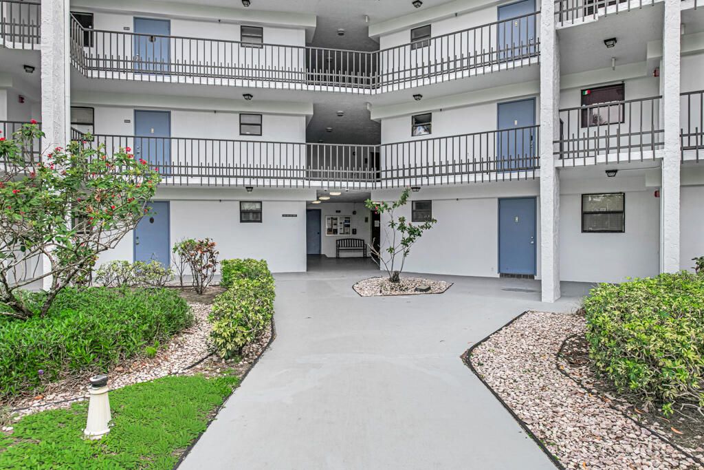 Photo of 4640 W Lucerne Lakes Blvd #206, Lake Worth, FL 33467 (MLS # B26026129)