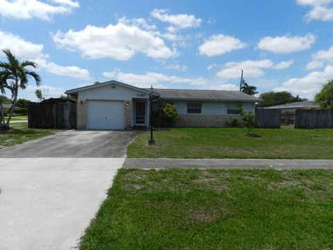 Photo of 3151 Pinehurst Drive, Lake Worth, FL 33467 (MLS # B26018559)