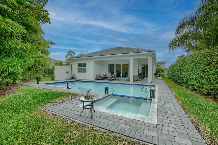 This is your home in Dakota !!!! Beautiful, private, immaculate Atlantic Grande Model in the double corner lot ! The 3rd bedroom is using as a an office . You will feel in love with the custom heated salty water pool by Van Kirk and Sons Pools.The Clubhouse is a Resort style living offering   a fitness center, indoor sports courts, a card room, pickleball and two lighted tennis courts, Resort Pool , children's' pool and playground, indoor half basketball court, and activities for all ages. Conveniently located near, airport, beach,&golf courses.