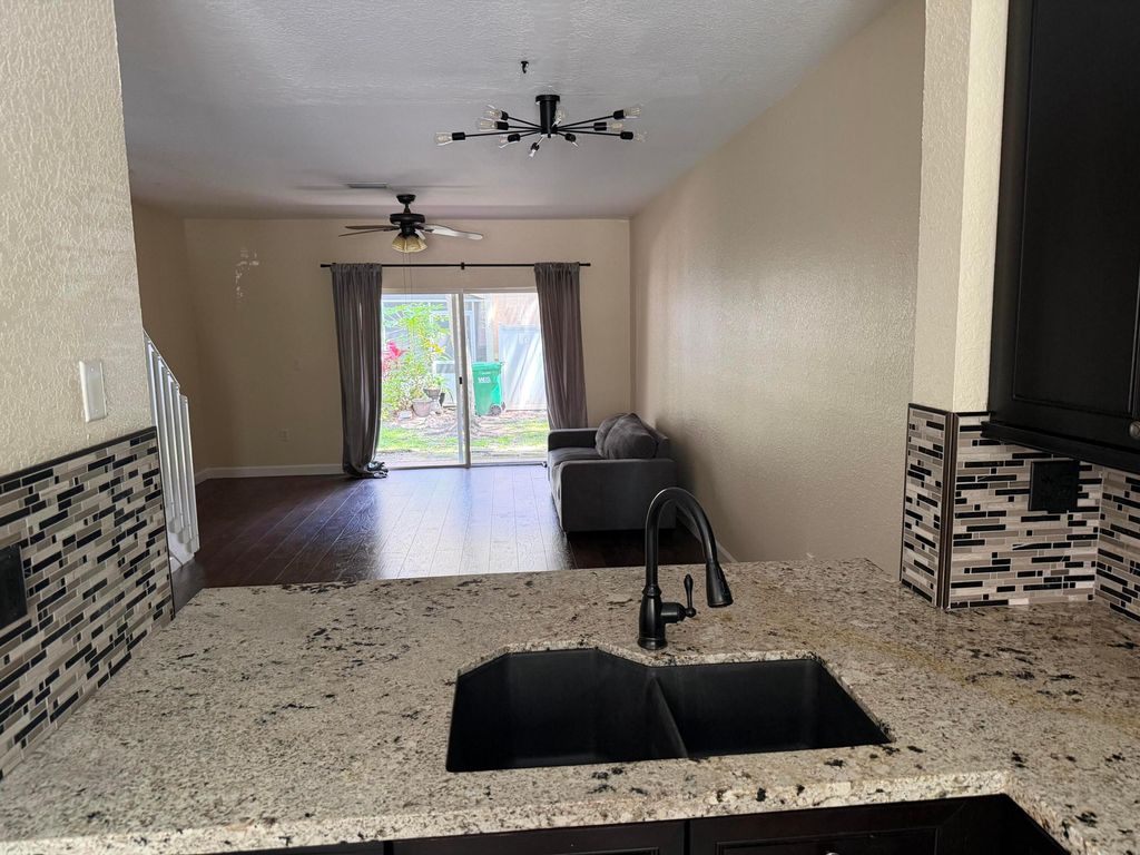 Photo of 8839 S Isles Circle, Tamarac, FL 33321 (MLS # B26025242)