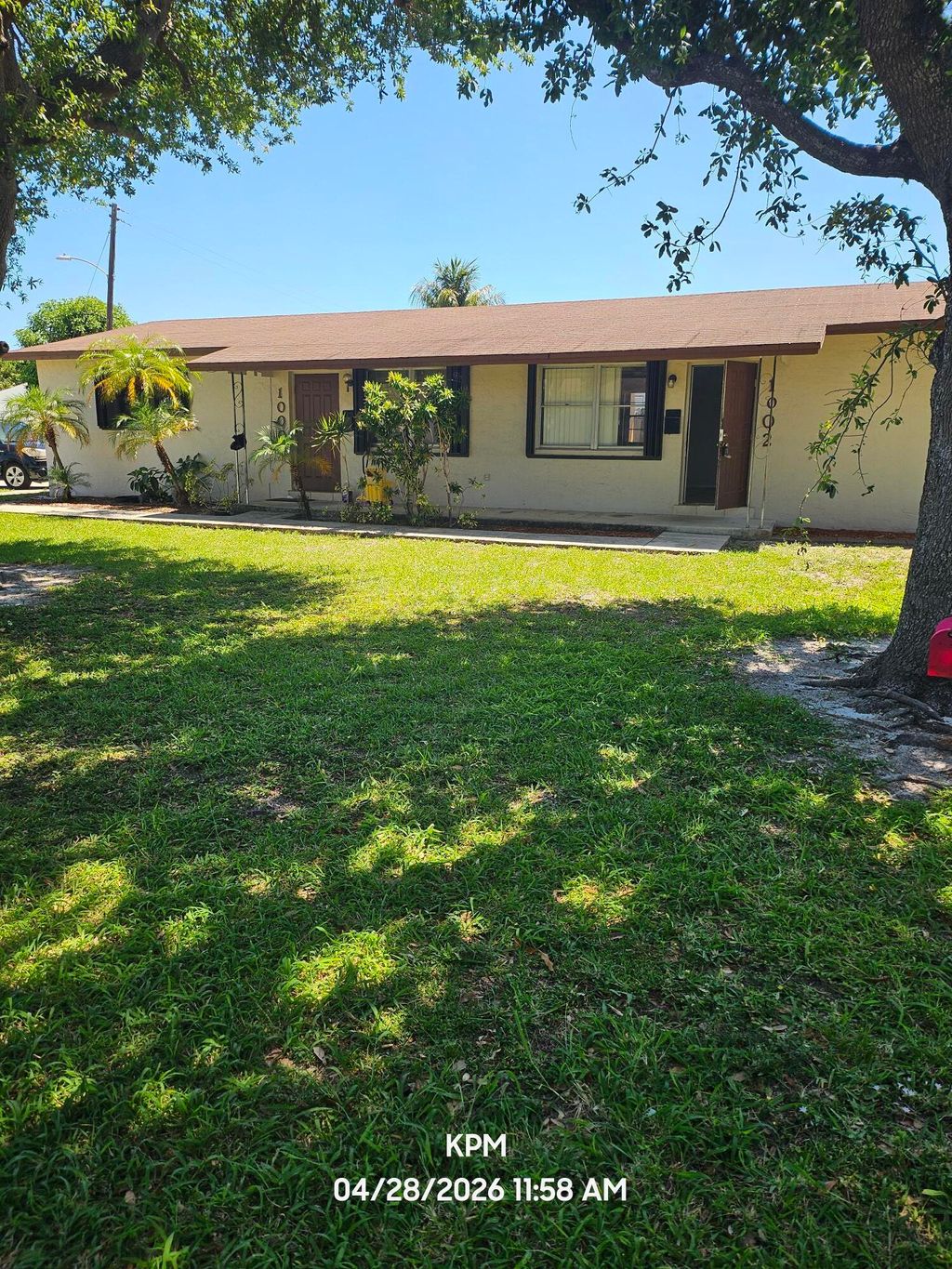 Photo of 1002 Mcintosh Street, West Palm Beach, FL 33405 (MLS # B26027868)