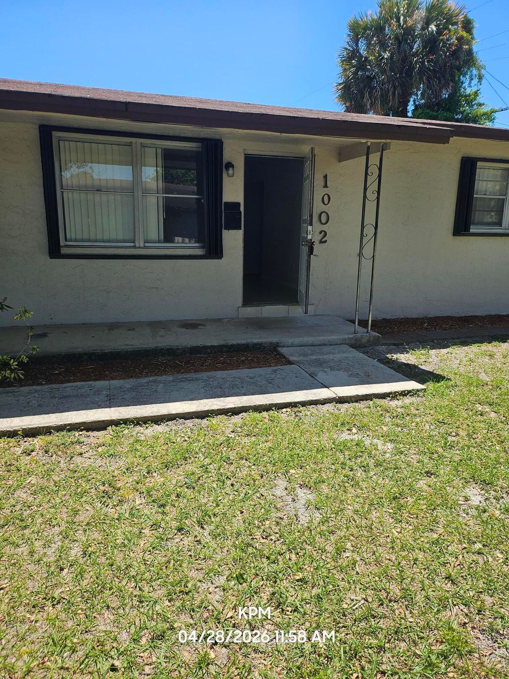 Photo of 1002 Mcintosh Street, West Palm Beach, FL 33405 (MLS # B26027868)