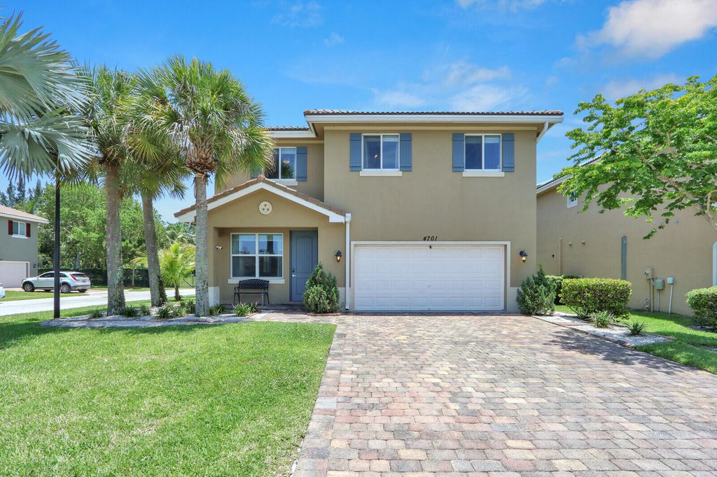 Photo of 4701 Foxtail Palm Court, Greenacres, FL 33463 (MLS # B26044344)