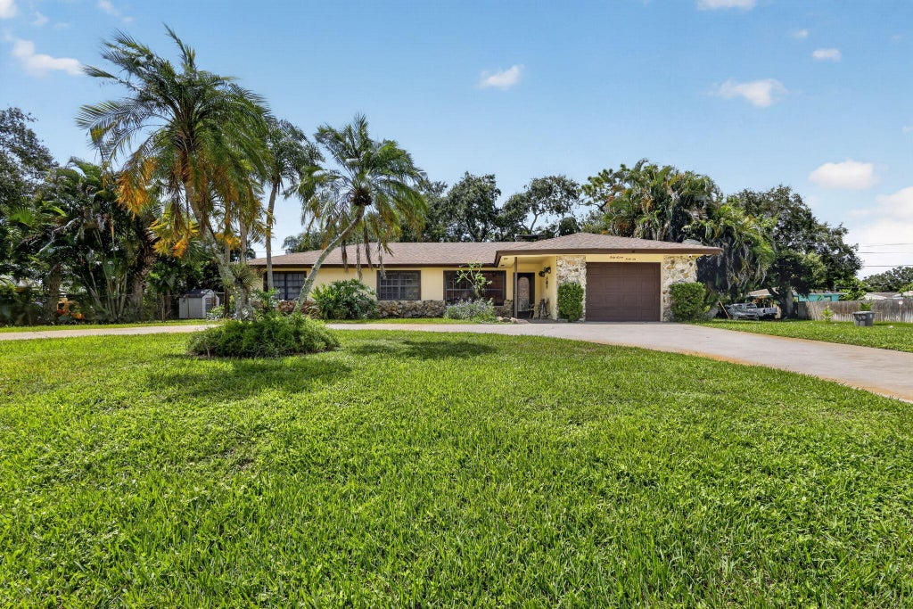 Photo of 4746 CANAL Drive, Lake Worth, FL 33463 (MLS # B26072903)