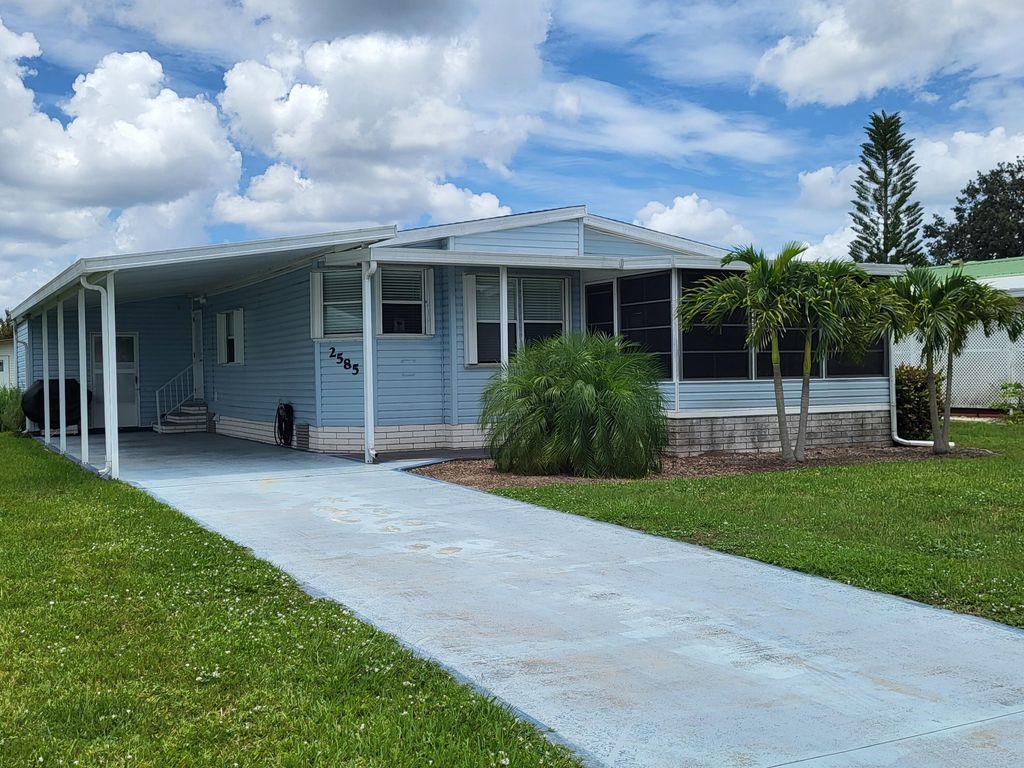 Photo of 2585 SW Marquis Terrace, Stuart, FL 34997 (MLS # R10807835)