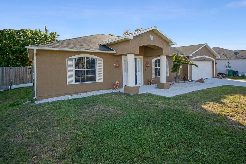 Photo of 1992 SW Mcallister Lane, Port Saint Lucie, FL 34953 (MLS # R10811399)