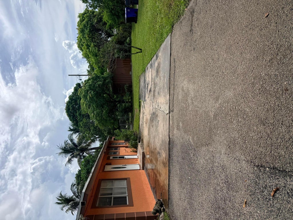 Photo of 1643 NW 11TH Avenue, Fort Lauderdale, FL 33311 (MLS # B26070708)