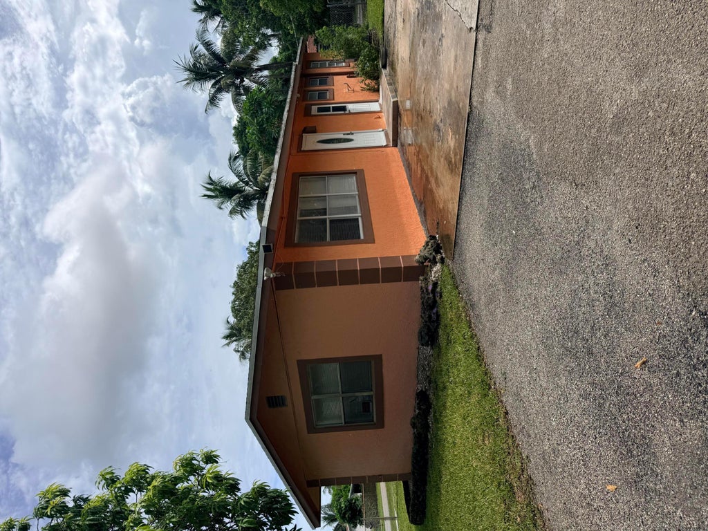 Photo of 1643 NW 11TH Avenue, Fort Lauderdale, FL 33311 (MLS # B26070708)