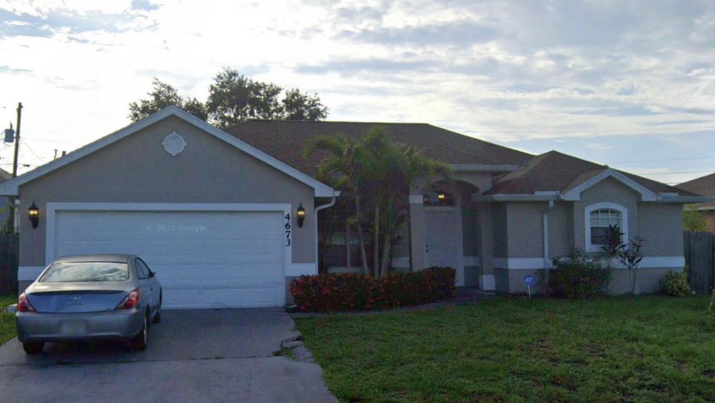Photo of 4673 SW Dactyl Street, Port Saint Lucie, FL 34953 (MLS # R10889683)