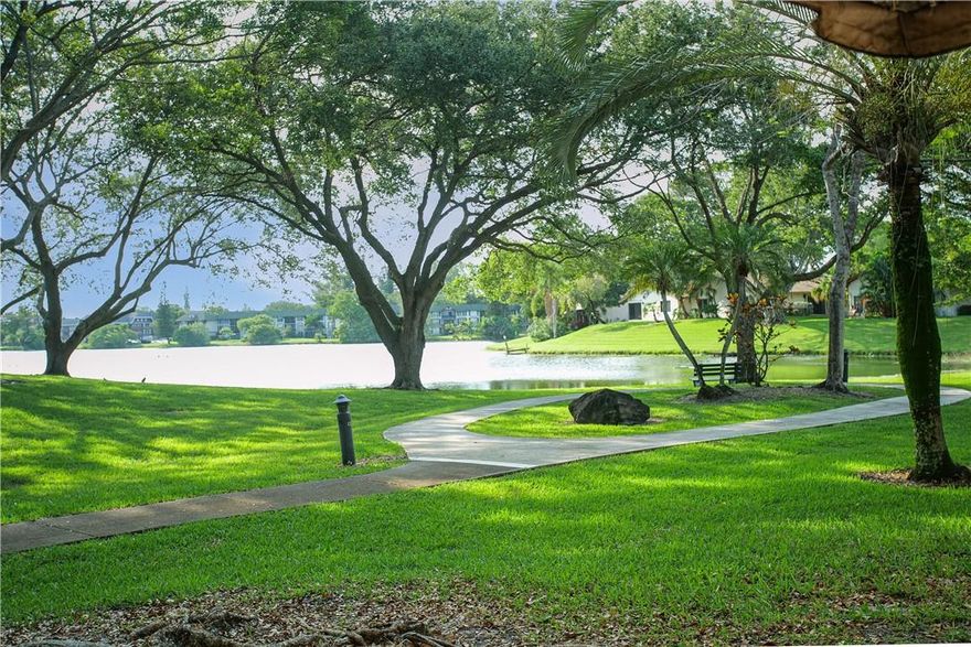 ENJOY YOUR GORGEOUS LAKE VIEW FROM THE LIVING & DINING RM!  IMPACT WINDOWS & DOORS DOWN STAIRS. CORNER 3/2,5 TRILEVEL TOWNHOUSE IN THE HEART OF INVERRARY!  ALL AGES! HAVE UP TO 2 PETS!  GATED COMMUNITY!!  TILE IN LIVING AREAS AND CAPRET IN BEDROOMS UPSTAIRS.  OVERSIZE 2 CAR GARAGE!  CONDO ASSOCIATION REQUIRES 725 CREDIT AND 25% DOWN IF FINANCING.  PARTIAL RESERVES. CAN RENT AFTER FIRST YEAR EITHER SEASONALLY OR YEARLY.  INCLUDED IN MAINT IS 24HR MANNED GUARD GATE!  50 ACRES OF LAND AN LANDSCAPING, TREE TRIMMING,, EXTERIOR OF BLDGS, PEST AND TERMITE TREAMENT, INSURANCE OF BLDGS.  COMMUNITY IS LIKE A PARK LOTS OF OLD BEAUTIFUL TREES.  RIDE YOUR BIKE OR WALK THE PATHWAYS   3 HEATED POOLS. COME PUT YOUR PERSONAL TOUCH TO THIS GREAT TOWNHOUSE!! SELLER WILL PAY FOR ROOF ASSESSMENT