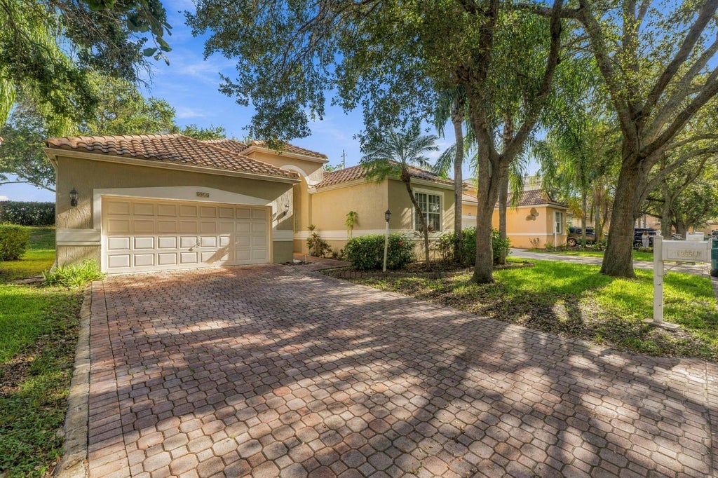 Photo of 6355 NW 80th Drive, Parkland, FL 33067 (MLS # B26085962)