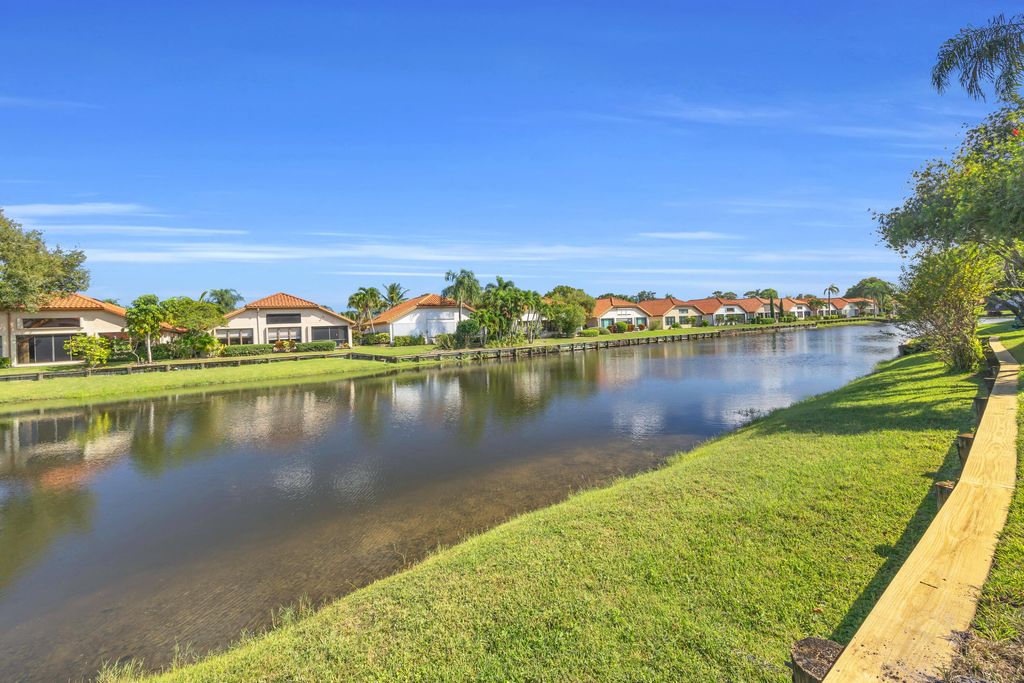 Photo of 2735 SW Mariposa Circle, Palm City, FL 34990 (MLS # B26001814)