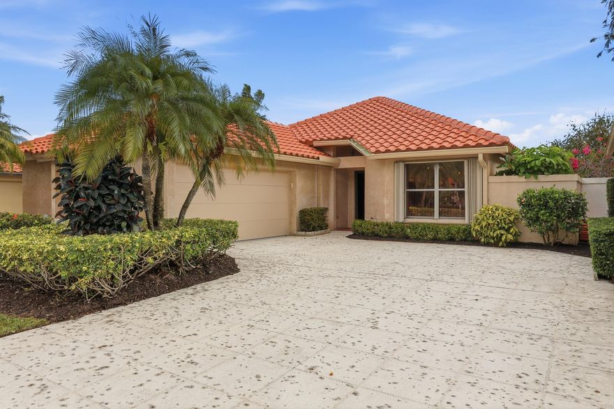 Welcome Home to Carefree Living in Mariposa, Palm City! Discover the perfect blend of comfort and convenience in this beautifully maintained 2-bedroom, 2-bath, 2-car garage home located in the sought-after Mariposa community. Enjoy peace of mind with a BRAND NEW ROOF, new impact-rated garage door, new landscaping, newer AC & the convenience of accordion shutters on all windows. Inside, you'll find a completely remodeled kitchen-updated from top to bottom with modern cabinetry, countertops, and appliances-plus updated bathrooms and tile flooring throughout home. This home has it all. Nothing needs to be done here, its move in ready!! The open, split floor plan offers a spacious and functional layout ideal for both relaxing and entertaining. Step out to your enclosed patio and take in the  serene lake views, the perfect spot for your morning coffee or evening unwind. This small community offers a carefree lifestyle with HOA amenities that include cable, lawn care, a community pool, tennis courts, and maintenance of common areas. Conveniently located within walking distance to shopping, dining, and more, this home truly has it all! Excellent school district! Don't miss your opportunity to call Mariposa home