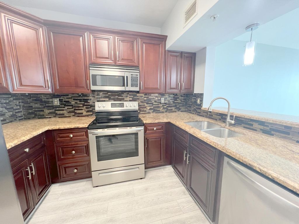 Photo of 3020 NE 32nd Ave #608, Fort Lauderdale, FL 33308 (MLS # B26000197)