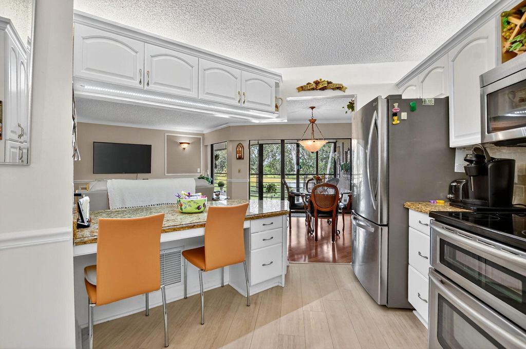 Photo of 5650 Camino Del Sol #200, Boca Raton, FL 33433 (MLS # R11117254)