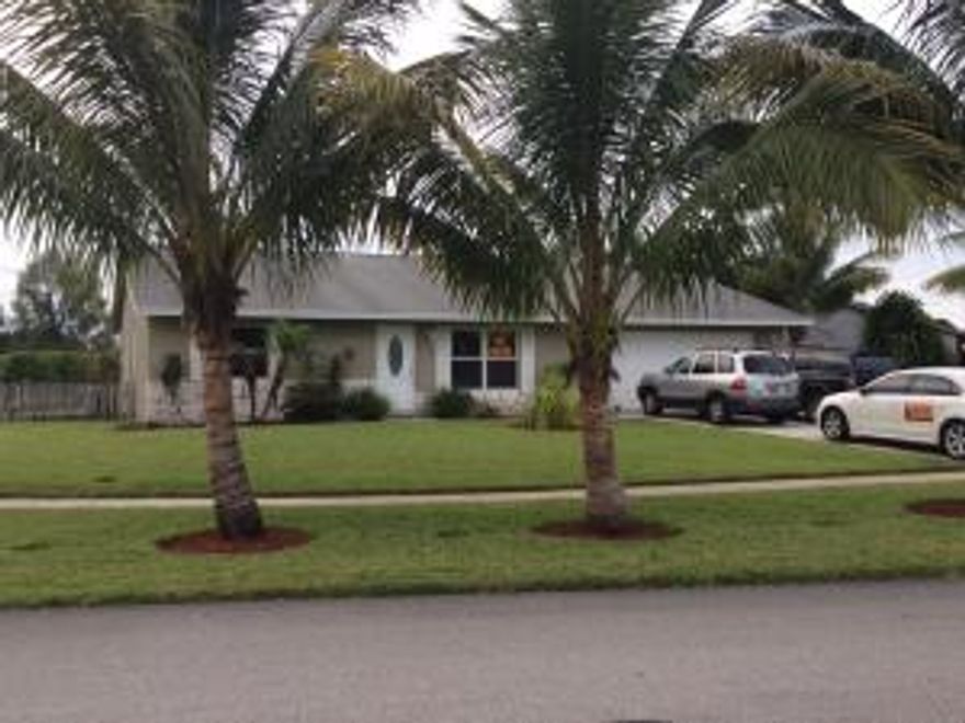 Beautiful updated lakeview home on huge lot with fenced yard.  Lake fed sprinkler system, gas stove and water heater and electric/gas dryer. Low HOA with NO restrictions! Garage is oversized wide and extra long with impact garage door.  Impact windows, new electrical panel, wiring and outlets thru-out.  New updated kitchen.  GAS STOVE and hot water heater!  Measurements deemed accurate, but not guaranteed.