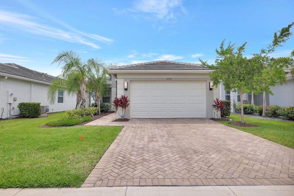 Photo of 11750 SW Lagoon Lane, Port Saint Lucie, FL 34987 (MLS # R11043809)
