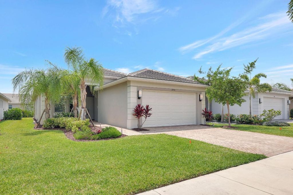 Photo of 11750 SW Lagoon Lane, Port Saint Lucie, FL 34987 (MLS # R11043809)