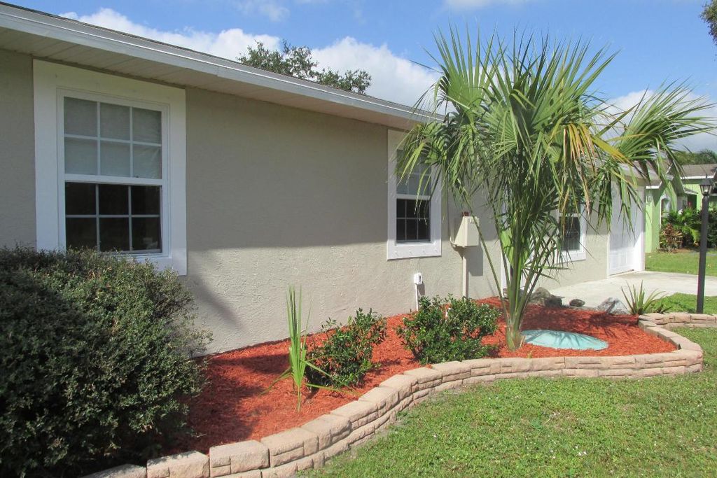 Photo of 986 SE Proctor Lane, Port Saint Lucie, FL 34983 (MLS # R10932352)