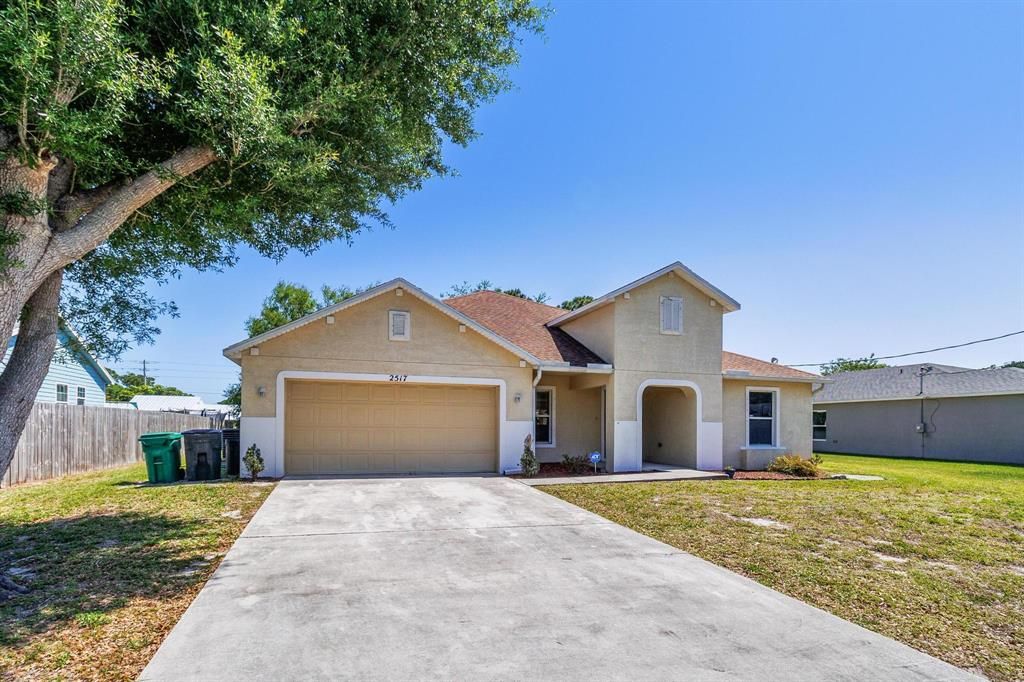Photo of 2517 SW Cooper Lane Ln, Port St Lucie, FL 34984 (MLS # R10787349)